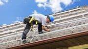 photodune-204073-man-working-on-roof-installing-rails-for-solar-panels-s